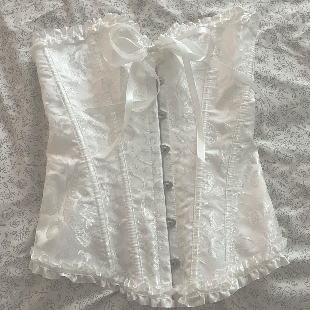 Corset top size small in perfect condition with adjustable back ribbon